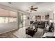 Relaxing living room with dark leather furniture and backyard access at 3829 S Harlan --, Mesa, AZ 85212