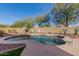 Kidney-shaped pool with a large patio perfect for entertaining at 3829 S Harlan --, Mesa, AZ 85212
