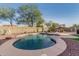 Inviting kidney-shaped pool with landscaping at 3829 S Harlan --, Mesa, AZ 85212