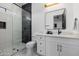Clean bathroom with white vanity and walk-in shower at 8533 E Avalon Dr, Scottsdale, AZ 85251
