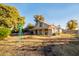 House with a large backyard and windmill at 937 E 6Th Ave, Mesa, AZ 85204