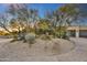 Circular driveway with desert landscaping at 10295 E Rising Sun Dr, Scottsdale, AZ 85262