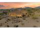 Luxury home with tile roof and desert landscape at 10432 E Winter Sun Dr, Scottsdale, AZ 85262