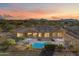 Home with solar panels, pool, and expansive backyard at 10432 E Winter Sun Dr, Scottsdale, AZ 85262