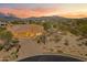 Stunning property with mountain views and desert landscaping at 10432 E Winter Sun Dr, Scottsdale, AZ 85262