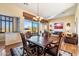 Open concept dining area with hardwood floors and views at 10432 E Winter Sun Dr, Scottsdale, AZ 85262