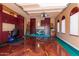 Well-organized garage with ample storage and metallic epoxy floor at 10432 E Winter Sun Dr, Scottsdale, AZ 85262