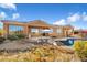 Beautiful home exterior with pool and patio at 10432 E Winter Sun Dr, Scottsdale, AZ 85262