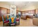Spacious kitchen featuring granite countertops and ample wood cabinetry at 10432 E Winter Sun Dr, Scottsdale, AZ 85262