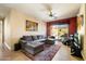 Living room with sectional sofa and access to backyard at 10432 E Winter Sun Dr, Scottsdale, AZ 85262