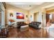Spacious living room with hardwood floors and southwestern decor at 10432 E Winter Sun Dr, Scottsdale, AZ 85262