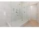 Large walk-in shower with marble tile and modern fixtures at 1437 W Iris Dr, Gilbert, AZ 85233