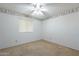 Simple bedroom with ceiling fan and window coverings at 1801 W Marlboro Dr, Chandler, AZ 85224