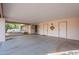 Covered carport with storage cabinets at 1801 W Marlboro Dr, Chandler, AZ 85224