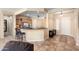 Island kitchen with granite countertops and stainless steel appliances at 20283 N 273Rd Ave, Buckeye, AZ 85396