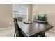 Dining area with rustic table and large fish tank at 22743 N Diamond Dr, Maricopa, AZ 85138