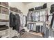 Large walk-in closet with ample shelving and hanging space at 2422 W Clearview Trl, Anthem, AZ 85086