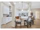 Modern kitchen with a curved island and cowhide stools at 27428 N Covered Wagon N Rd, Phoenix, AZ 85085