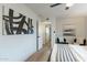 Modern bedroom with a large bed, contemporary art, and plenty of space at 3439 W Krall St, Phoenix, AZ 85017