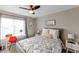 Bedroom with a queen-size bed, desk, and ceiling fan at 3500 N Hayden Rd # 1404, Scottsdale, AZ 85251