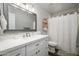 Clean bathroom with white vanity and shower/tub combo at 4636 E Danbury Rd, Phoenix, AZ 85032