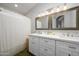Modern bathroom with double vanity and large shower at 4636 E Danbury Rd, Phoenix, AZ 85032