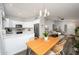 Light and bright dining area with a view into the living room and kitchen at 4636 E Danbury Rd, Phoenix, AZ 85032