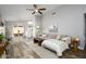 Open concept living room with hardwood floors and dining area at 4636 E Danbury Rd, Phoenix, AZ 85032