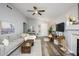 Relaxing living room with hardwood floors, fireplace and lots of natural light at 4636 E Danbury Rd, Phoenix, AZ 85032