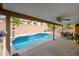 Refreshing backyard pool, covered patio, and dining space at 4636 E Danbury Rd, Phoenix, AZ 85032