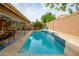 Refreshing swimming pool with spacious deck for lounging at 4636 E Danbury Rd, Phoenix, AZ 85032