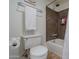 Clean bathroom with tub, shower, and a white toilet at 4925 N 73Rd St # 11, Scottsdale, AZ 85251