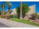 Condo building with palm trees and grassy areas at 4925 N 73Rd St # 11, Scottsdale, AZ 85251