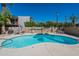 Community pool with ample deck space for lounging at 4925 N 73Rd St # 11, Scottsdale, AZ 85251