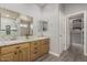 Bathroom boasts dual sinks, granite counters, and a walk-in shower at 5736 E Lawndale St, Mesa, AZ 85215
