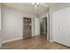 Bedroom with double doors leading to a bathroom and plenty of closet space at 5736 E Lawndale St, Mesa, AZ 85215