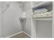 Well-organized closet with shelves and hanging rods at 5736 E Lawndale St, Mesa, AZ 85215