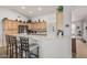 Kitchen features granite countertops, light wood cabinets, and stainless steel appliances at 5736 E Lawndale St, Mesa, AZ 85215