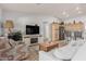 Living room features a fireplace and an open floor plan at 5736 E Lawndale St, Mesa, AZ 85215