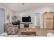 Living room features a fireplace and an open floor plan at 5736 E Lawndale St, Mesa, AZ 85215