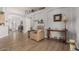 Spacious living room with hardwood floors and large windows at 5736 E Lawndale St, Mesa, AZ 85215