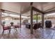 Covered patio with seating area, dining table, and grill at 5736 E Lawndale St, Mesa, AZ 85215