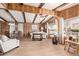 Living room with wood paneling, vaulted ceiling and dining area at 643 S 83Rd Way, Mesa, AZ 85208