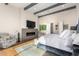 Serene main bedroom features a cozy sitting area and fireplace at 7131 E Foothill Dr, Paradise Valley, AZ 85253