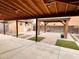 Covered patio, gazebo, and storage shed in backyard at 881 E Appaloosa Rd, Gilbert, AZ 85296