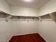 Large walk-in closet with double hanging rods at 881 E Appaloosa Rd, Gilbert, AZ 85296