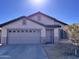 Single-story house with a two-car garage and neutral color scheme at 881 E Appaloosa Rd, Gilbert, AZ 85296
