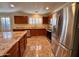 Kitchen boasts stainless steel appliances and granite countertops at 881 E Appaloosa Rd, Gilbert, AZ 85296