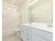 Clean bathroom with double vanity, tub, and shower at 9567 W Robin Ln, Peoria, AZ 85383