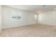 Spacious bedroom with neutral decor and carpet flooring at 9567 W Robin Ln, Peoria, AZ 85383